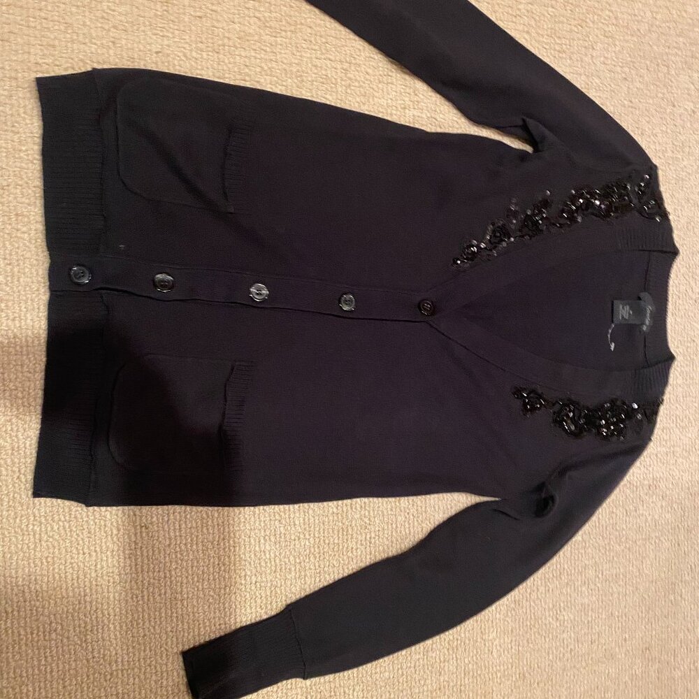 Sweater. button down, casual and fancy.  Marked M but really fits S better